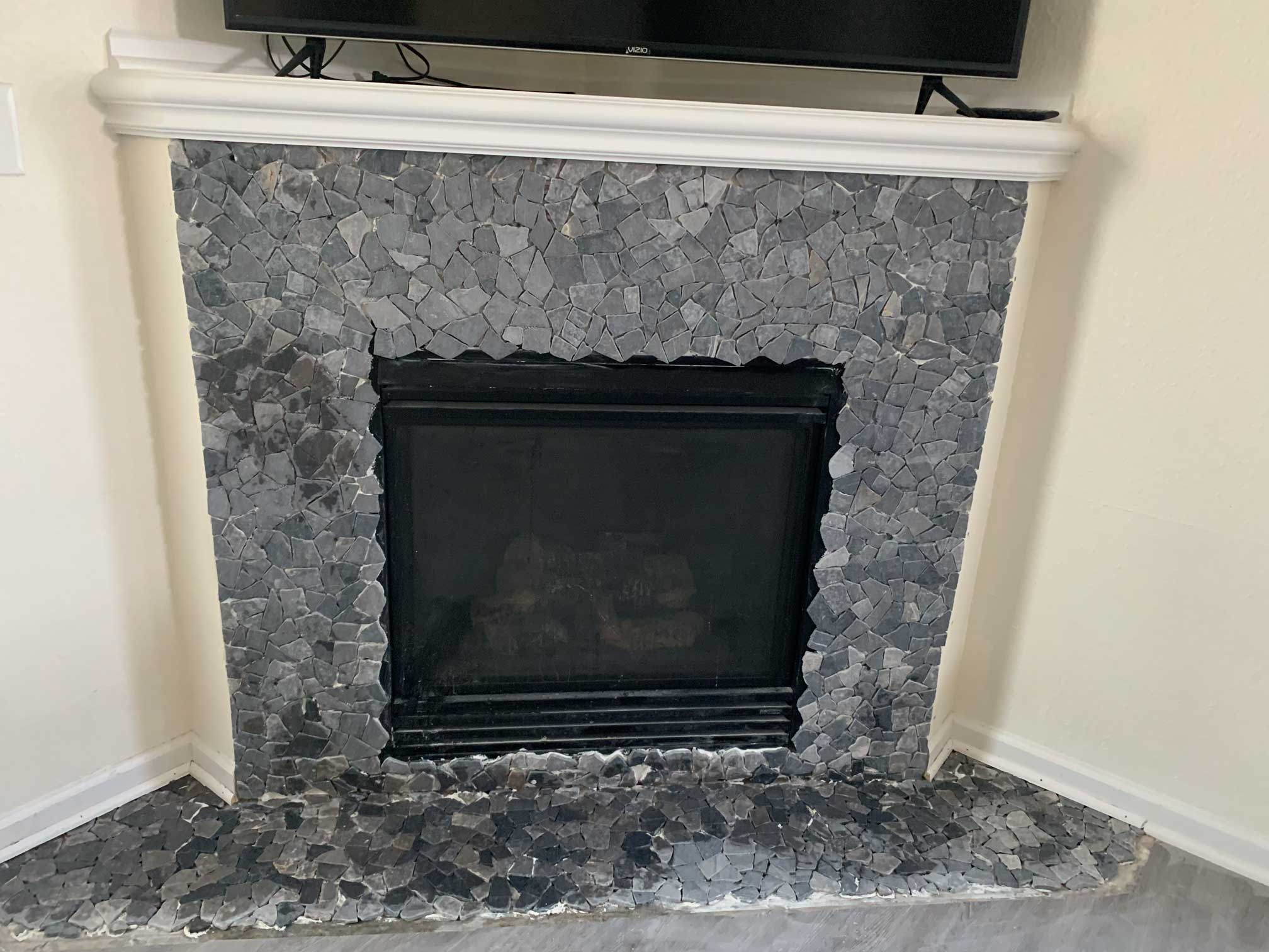 Fireplace and mantle redesign with tile
